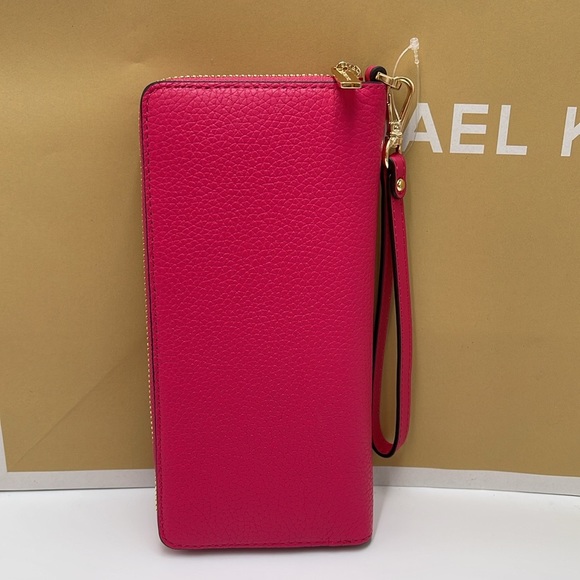 MICHAEL KORS
Leather Continental Wristlet Phone Case Wallet
Electric Pink
NWT - Picture 13 of 16